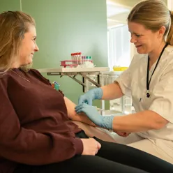 A doctor attending to a patient