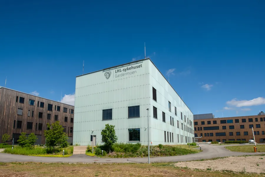 A large building with a parking lot
