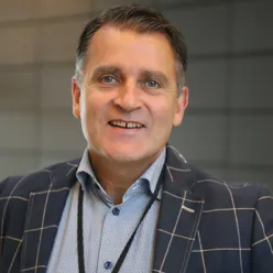 A man smiling for the camera