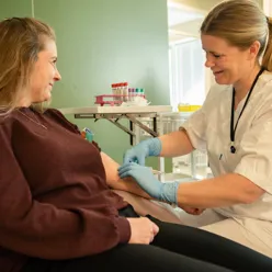 A doctor talking to a patient