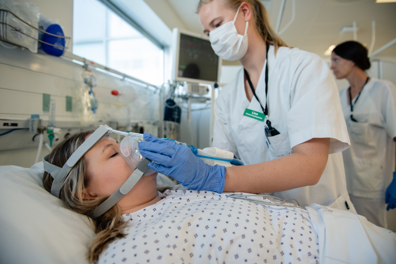 A dentist working on a patient