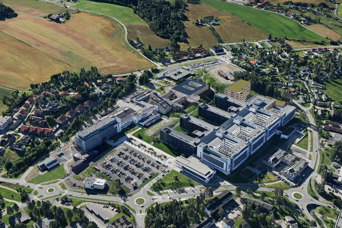 Illustrasjonsbilde av det nye somatikkbygget og resten av Ahus Nordbyhagen fra luften.