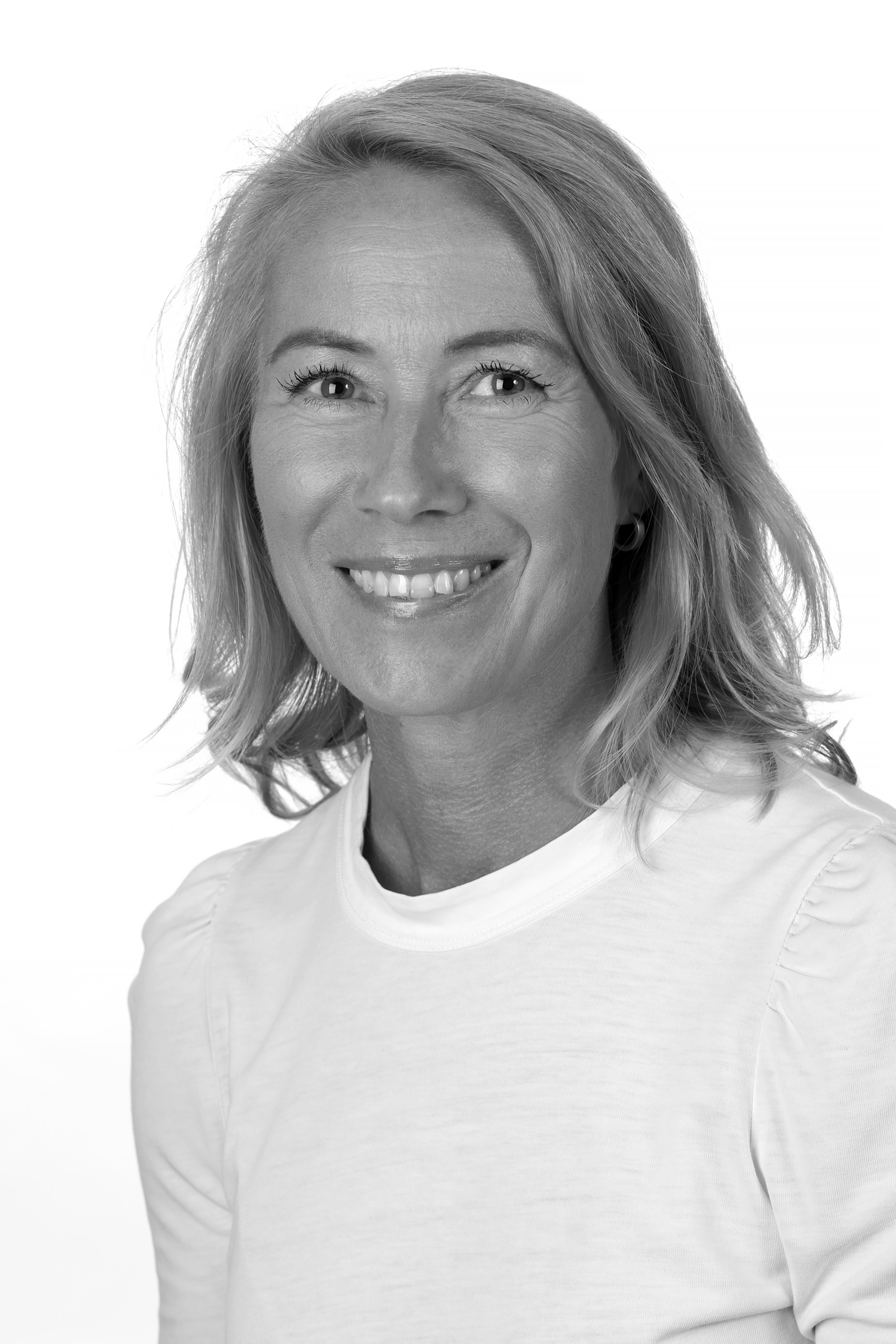 A woman smiling for the camera