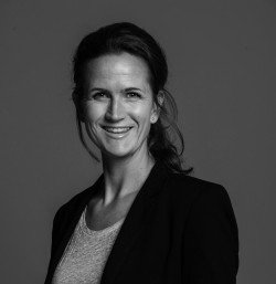 En person som smiler for kameraet