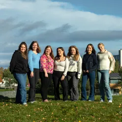 A group of women posing for a photo